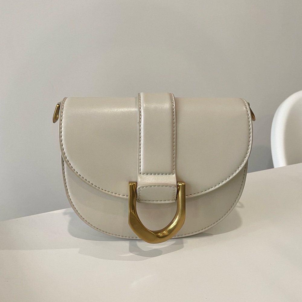Charles & Keith | Mini Gabine Saddle Bag | Cream